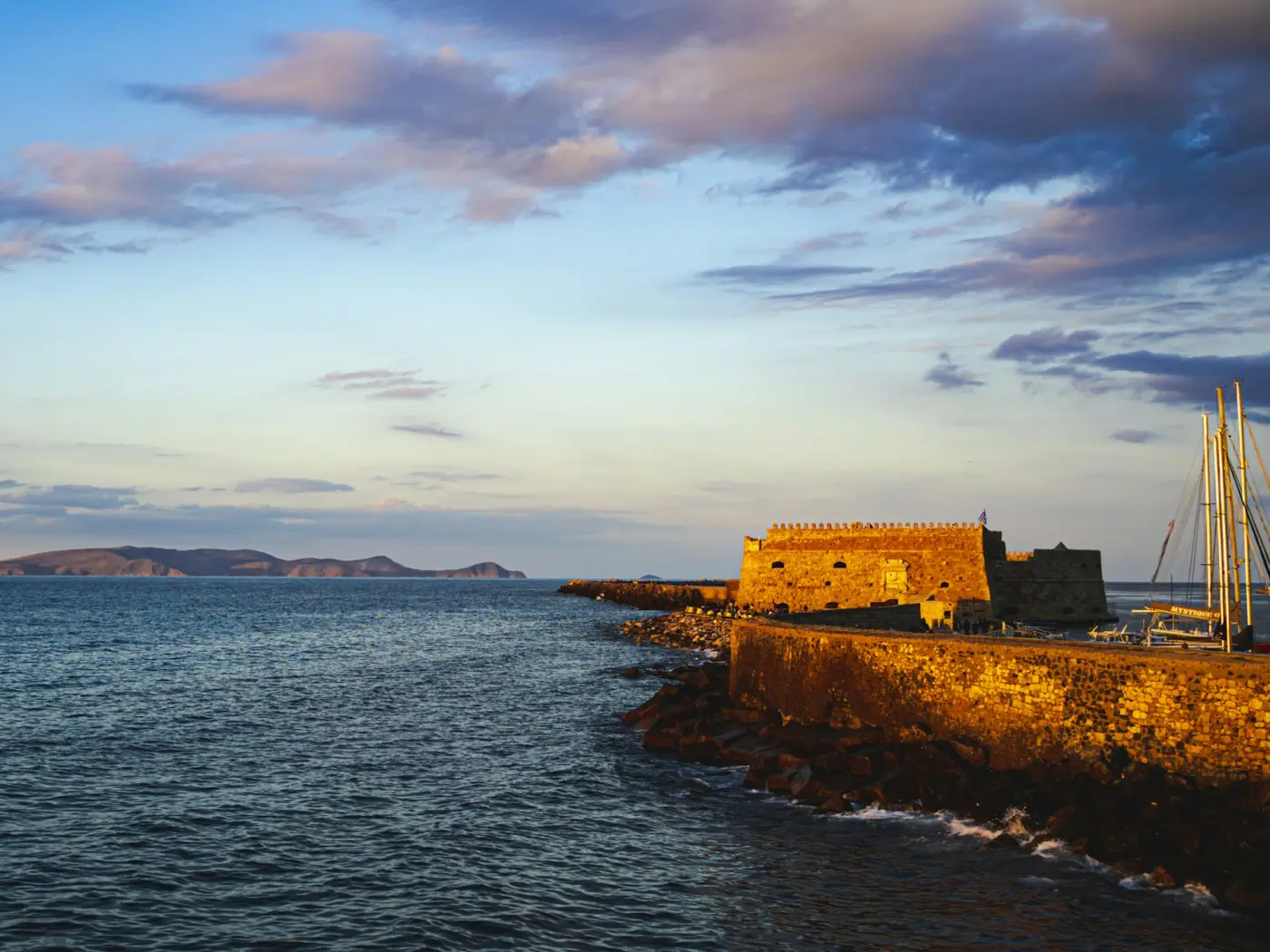 Koules Venetian fortress and the sea at Heraklion, Crete, at sunset