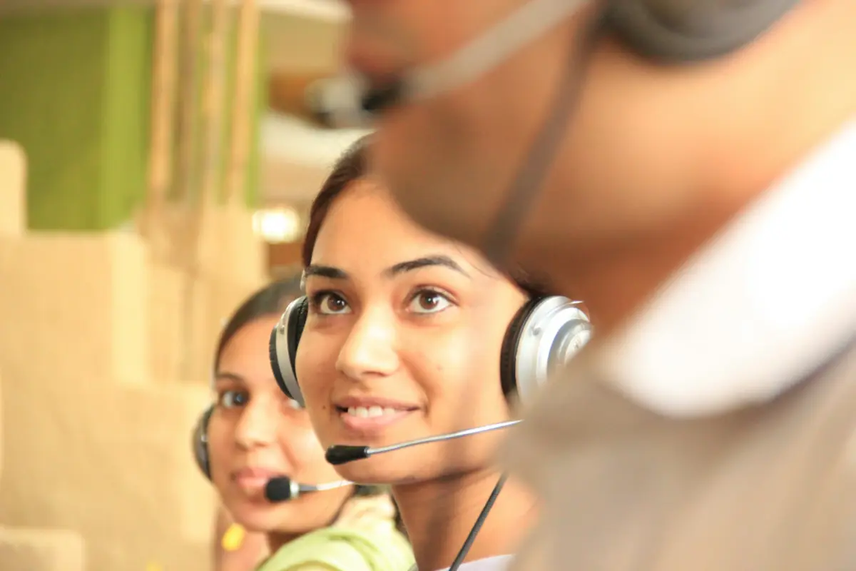 Assistance coordinators with headsets in an operations room